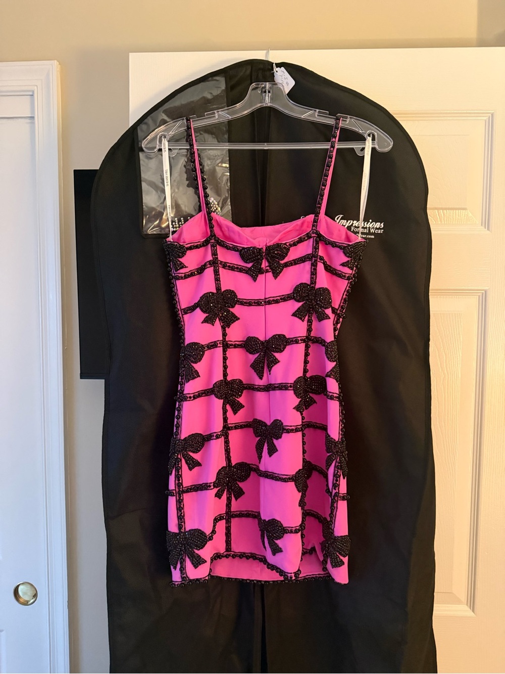Sherri Hill Hot Pink Mini Dress with Black Bow Grid- STYLE 57330 - Picture 2 of 3